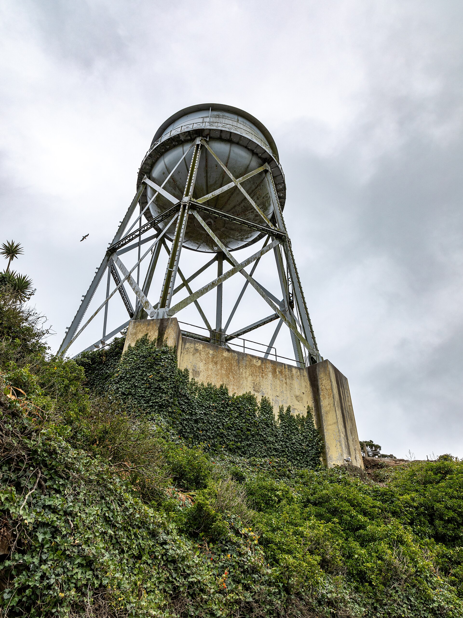 The weathered water tower of Alcatraz Penitentiary